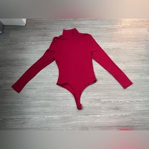 Red long sleeve body suit